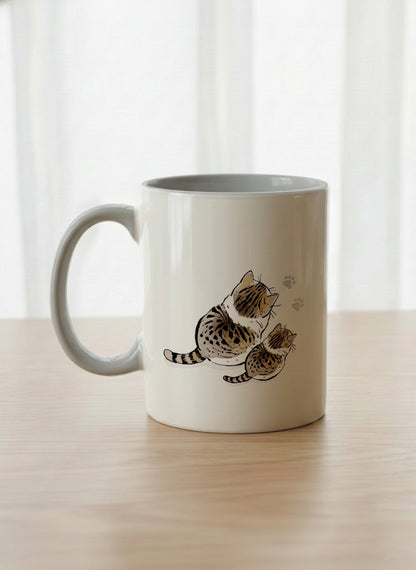 classic mug | By Your Side left view mug with two cats and paw prints, by Hyun Jung Cho- Gallery By Inhesion