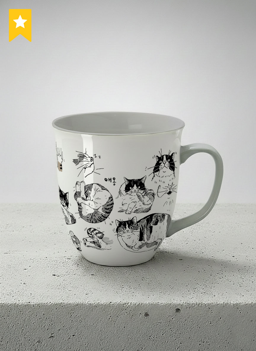 ronny mug | Moments of Curiosity mug  ink-sketched cats in playful poses with Korean script on white, grey interior, by Hyun Jung Cho