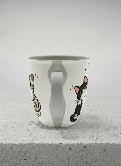 ronny mug | Best Buddies side view mug small tuxedo cat leaning into a chubby tabby with tiny floating hearts, sage interior, by Hyun Jung Cho