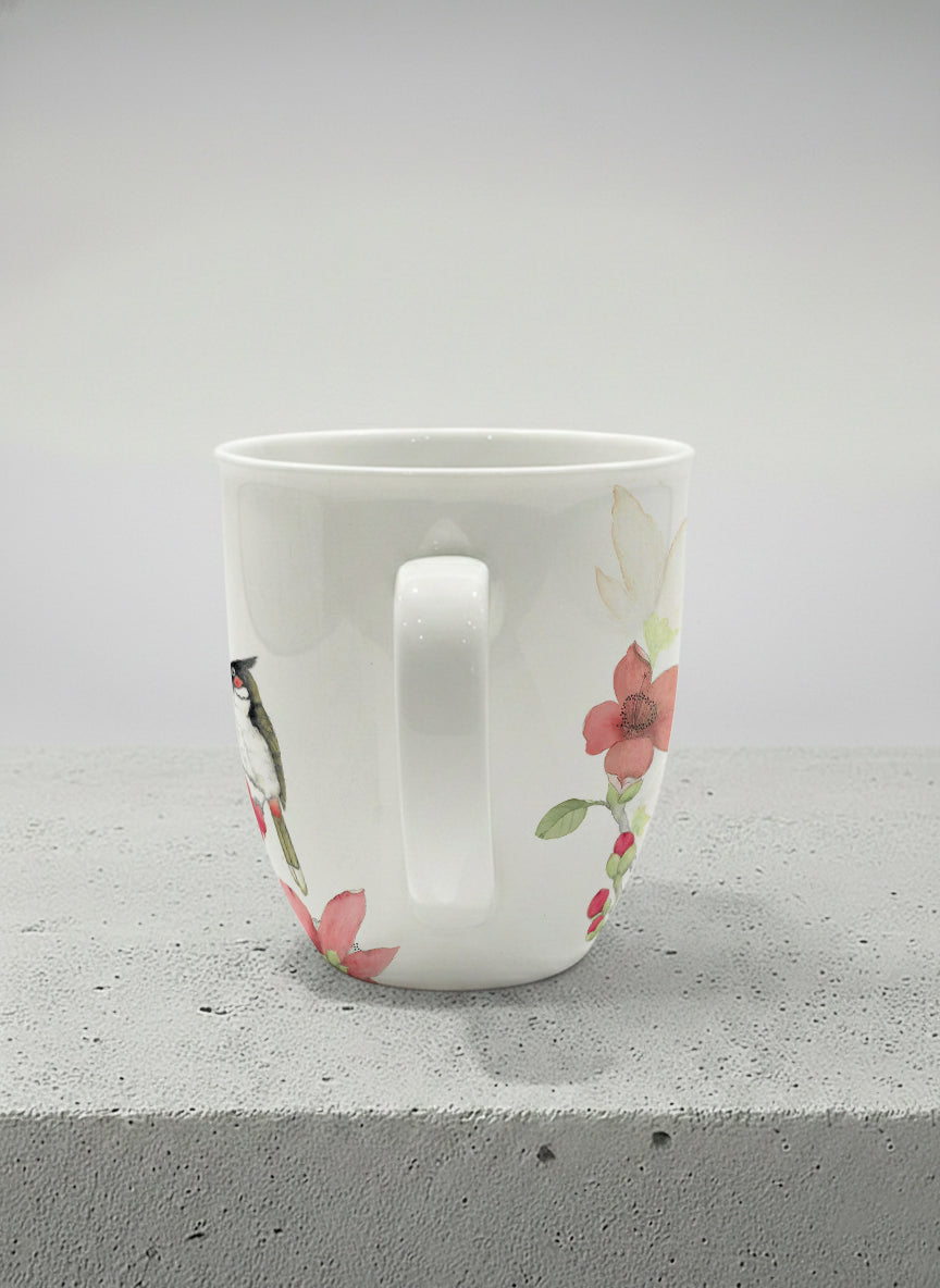 Ronny Mug | The Radiance of Red Kapok side view mug with watercolor illustration of a red bird and pink flowers artwork by Alice Wong - Gallery By Inhesion