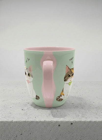ronny mug | The Perfect Pair side view mug two cats with Korean name tags and bow ties on mint green, blush pink interior, by Hyun Jung Cho