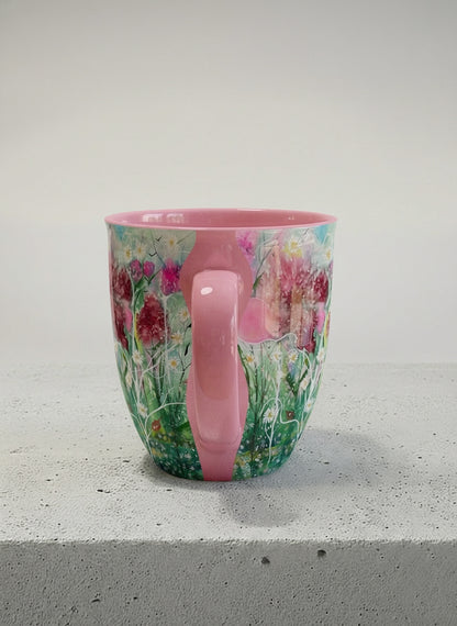 Ronny Mug | Nature’s waking up side view mug shows a floral design with colorful blossoms and lush greenery by Renee Pupetz - Gallery By Inhesion