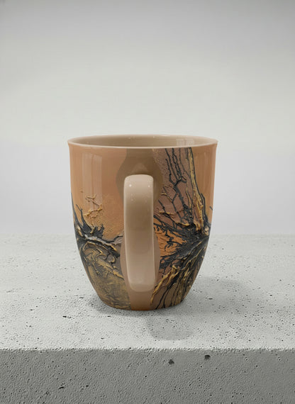 Ronny Mug | Flowing Essence side view mug showing abstract marbled pattern in brown, black, and gold tones by Mersedes Mein - Gallery By Inhesion