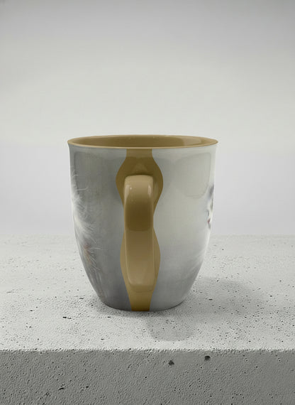 ronny Mug | Wild and Free side view mug, photorealistic cat portrait emerging from a soft smoky mist, warm beige interior and handle, by Karina Mosser - Gallery By Inhesion