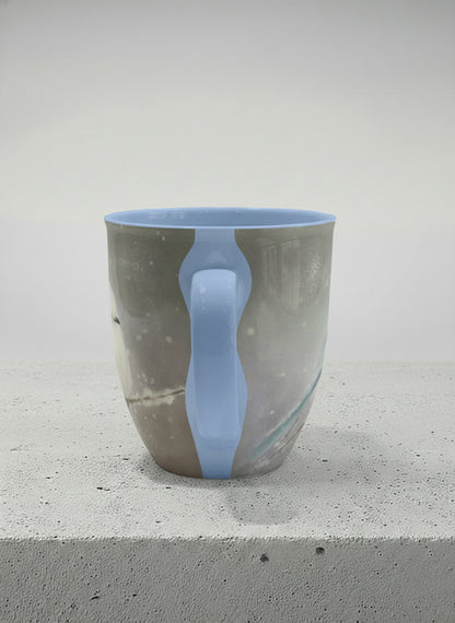 ronny mug | A Moment in the Snow side view mug, a fluffy white bird perched quietly in a soft wintry haze, sky blue interior and handle, by Karina Mosser - Gallery By Inhesion