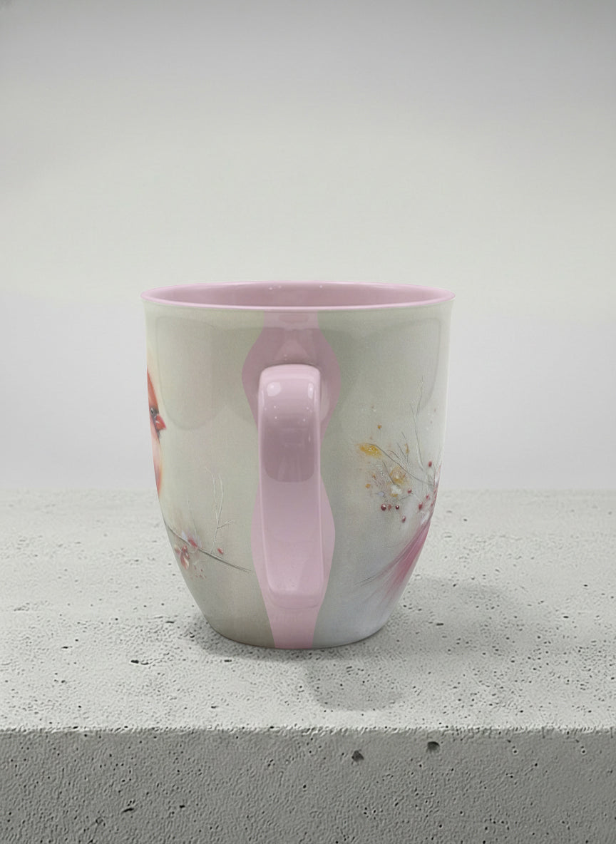 ronny mug | lossom Visitor side view mug, a delicate pink cardinal perched on a wispy blossom branch against a soft ivory mist, blush pink interior and handle, by Karina Mosser - Gallery By Inhesion