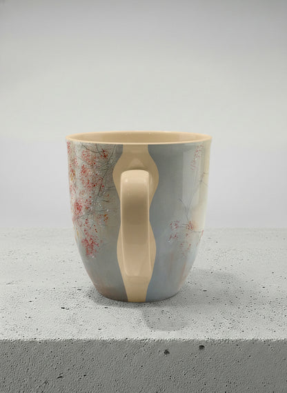ronny mug | Quiet Waters side view mug, delicate red blossoms and fine branches drifting across a soft celadon mist, warm cream interior and handle, by Karina Mosser - Gallery By Inhesion
