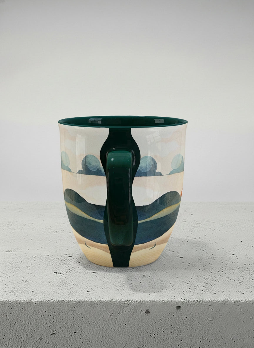 Ronny mug | Share a Sunset side view mug a lone figure walking through rolling sand dunes beneath a glowing orange sun and layered teal clouds, deep teal interior and handle, by KikaG - Gallery By Inhesion