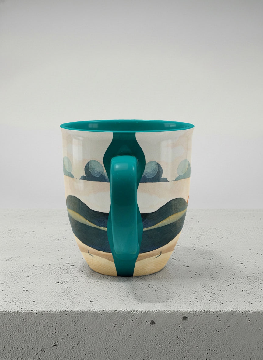 ronny mug | Share a Sunset side view  mug a lone figure walking through rolling sand dunes beneath a glowing orange sun and layered teal clouds, deep teal interior and handle, by KikaG - Gallery By Inhesion