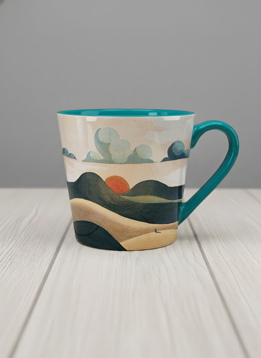 conical mug | Share a Sunset mug a lone figure walking through rolling sand dunes beneath a glowing orange sun and layered teal clouds, deep teal interior and handle, by KikaG - Gallery By Inhesion