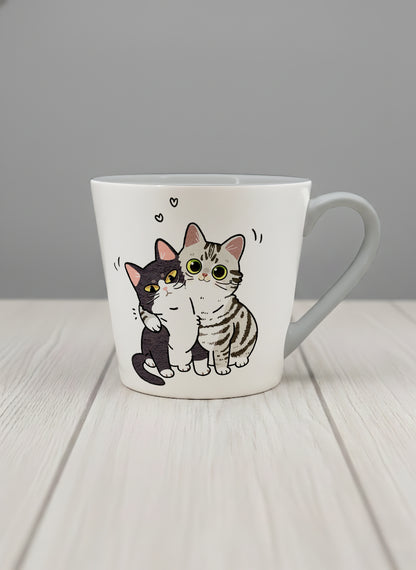 conical mug | Best Buddies mug small tuxedo cat leaning into a chubby tabby with tiny floating hearts, sage interior, by Hyun Jung Cho