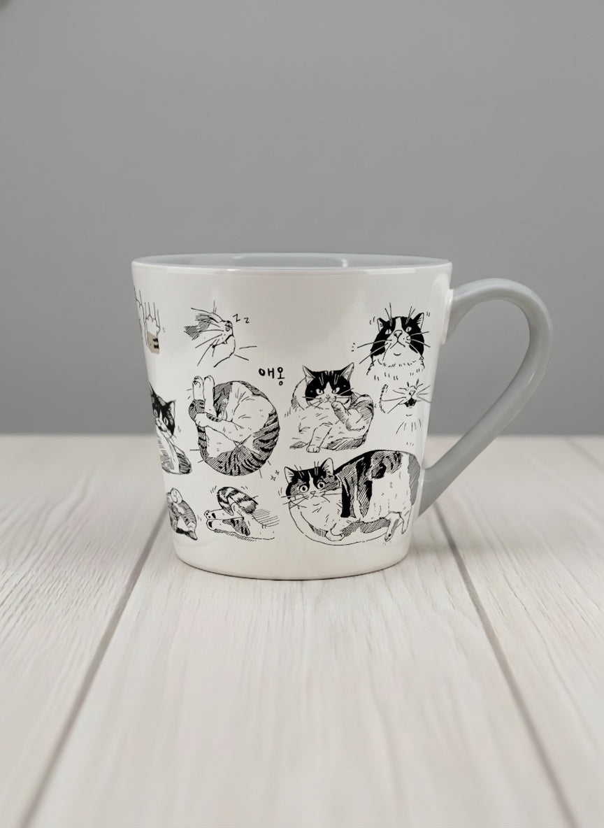 conical mug | Moments of Curiosity mug  ink-sketched cats in playful poses with Korean script on white, grey interior, by Hyun Jung Cho