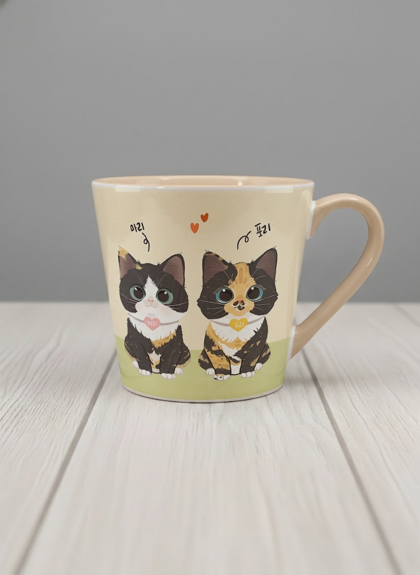 Conical mug | Our Precious Pair mug, two adorable tuxedo cats side by side with Korean name tags and tiny red hearts, soft cream interior and handle, by Hyun Jung Cho - Gallery By Inhesion
