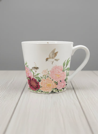 Conical Mug | A Tapestry of Flowers mug with watercolor bird flying amid pink/red flowers by Alice Wong - Gallery By Inhesion