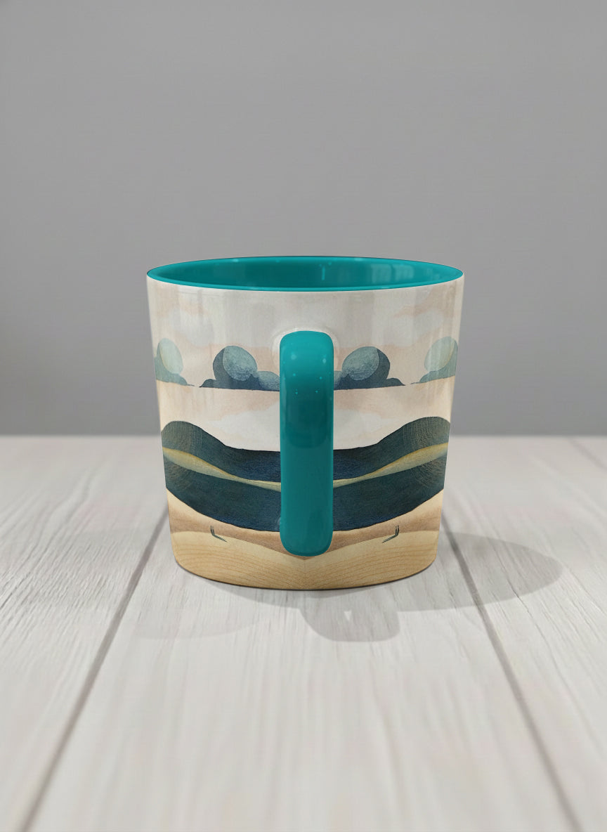 conical mug | Share a Sunset side view  mug a lone figure walking through rolling sand dunes beneath a glowing orange sun and layered teal clouds, deep teal interior and handle, by KikaG - Gallery By Inhesion