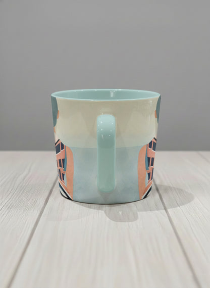 conical mug | Memory on the Bridge side view mug a solitary figure gazing over a sunlit Venetian canal lined with terracotta buildings, soft powder blue interior and handle, by KikaG - Gallery By Inhesion