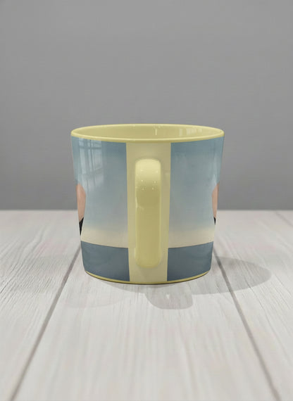 Conical mug | A Mountain to Climb side view mug woman gazing over jagged peaks and a golden sun on teal horizon, butter yellow interior, by KikaG - Gallery By Inhesion
