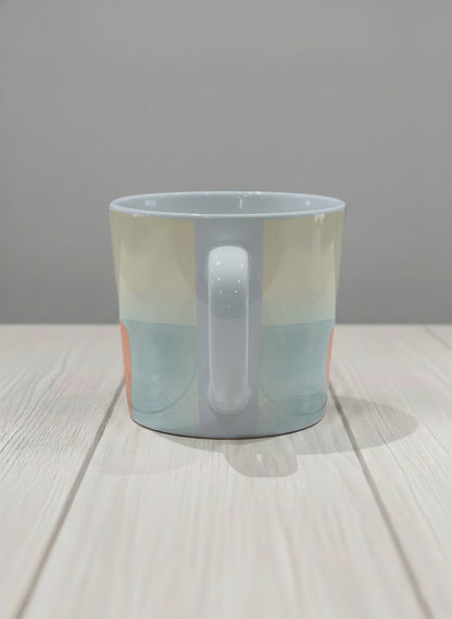 Conical mug | Memory on the Bridge side view mug a solitary figure gazing over a sunlit Venetian canal lined with terracotta buildings, soft powder blue interior and handle, by KikaG - Gallery By Inhesion