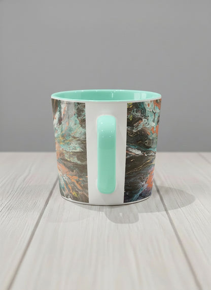 Conical Mug | Winged Light side view mug showing a fluid art painting with swirling, multicolored design by Renee Pupetz - Gallery By Inhesion