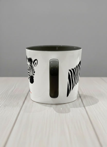 Conical Mug | Swinging between reality and illusion side view mug with a zebra illustration and a person swinging under it by Tang Yau Hoong - Gallery By Inhesion