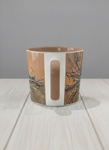 Conical Mug | Flowing Essence side view mug showing abstract marbled pattern in brown, black, and gold tones by Mersedes Mein - Gallery By Inhesion