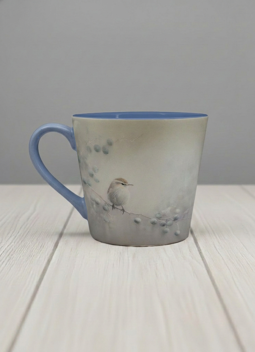 conical mug | A Quiet Moment left view mug,solitary bird perched in a soft misty landscape with delicate dot details, dusty blue interior and handle, by Karina Mosser - Gallery By Inhesion