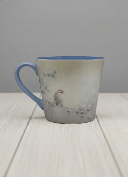 conical mug | A Quiet Moment left view mug,solitary bird perched in a soft misty landscape with delicate dot details, dusty blue interior and handle, by Karina Mosser - Gallery By Inhesion
