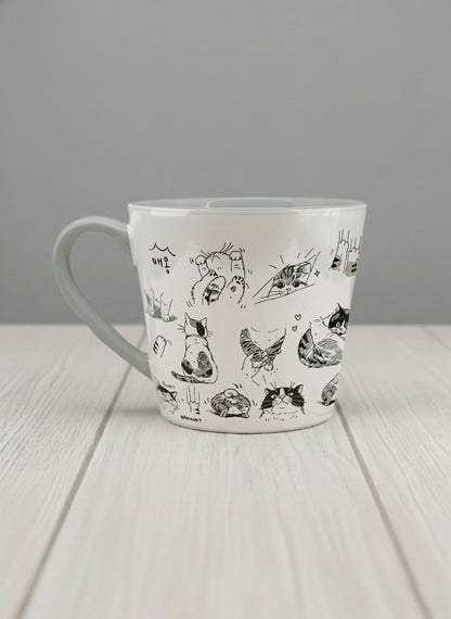 conical mug | Moments of Curiosity left view mug  ink-sketched cats in playful poses with Korean script on white, grey interior, by Hyun Jung Cho