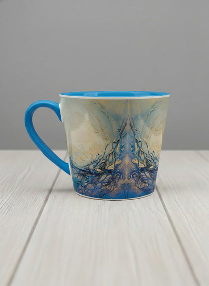 Conical Mug | Touches of depth left view mug showing abstract pattern in blue, white, and gold by Mersedes Mein - Gallery By Inhesion