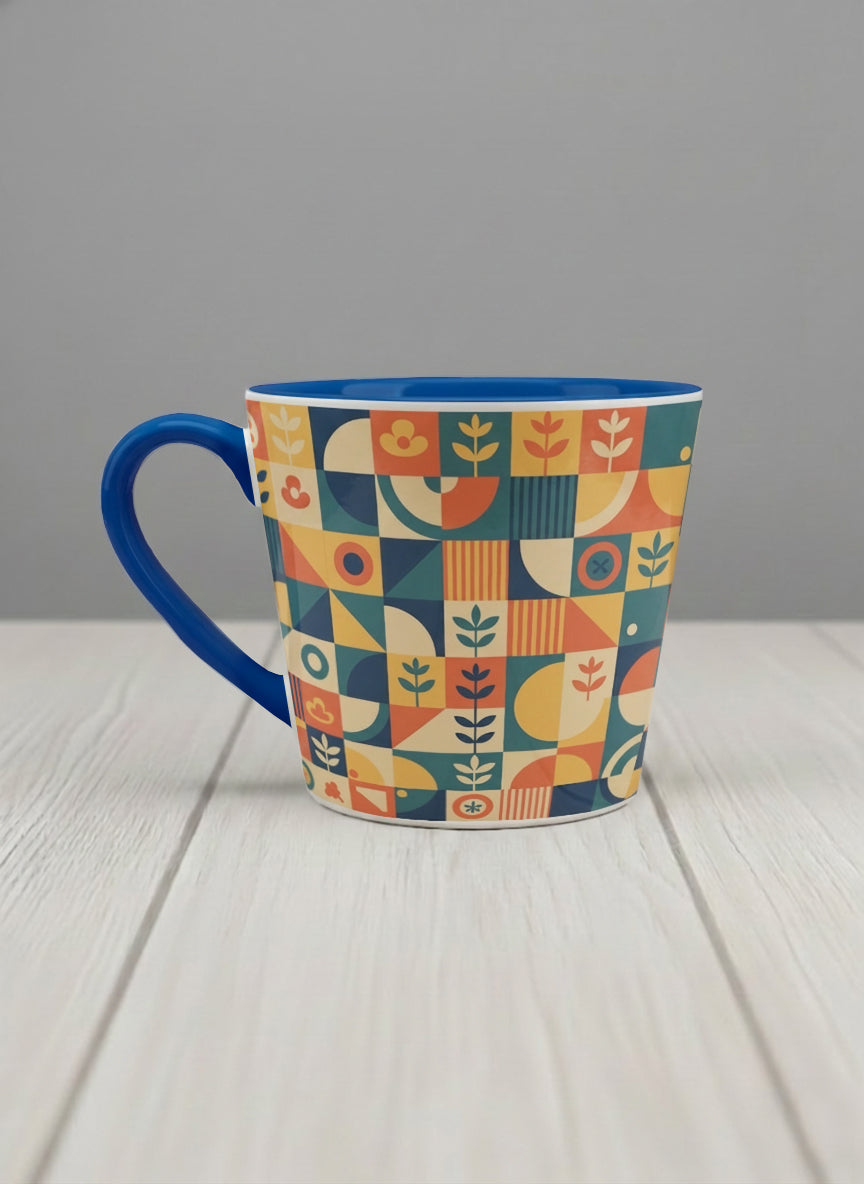 Conical Mug | Bloom Across Realities left view mug, bold geometric pattern, blue interior and handle, concrete surface  by Alan CL Lee - Gallery By Inhesion